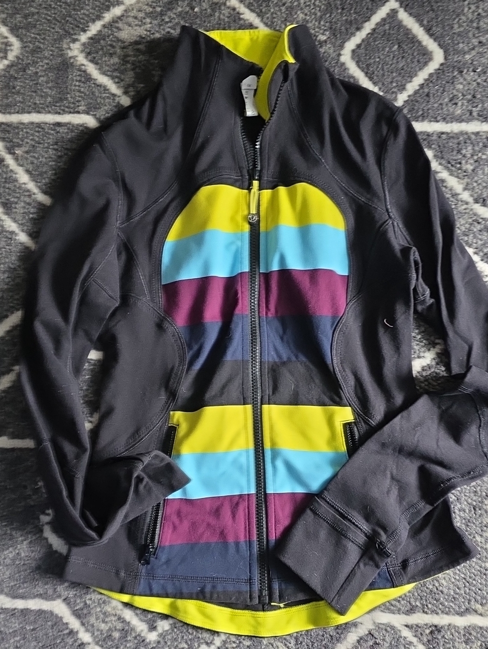lululemon athletica Black Jacket with Yellow, Blue, and Purple Stripes